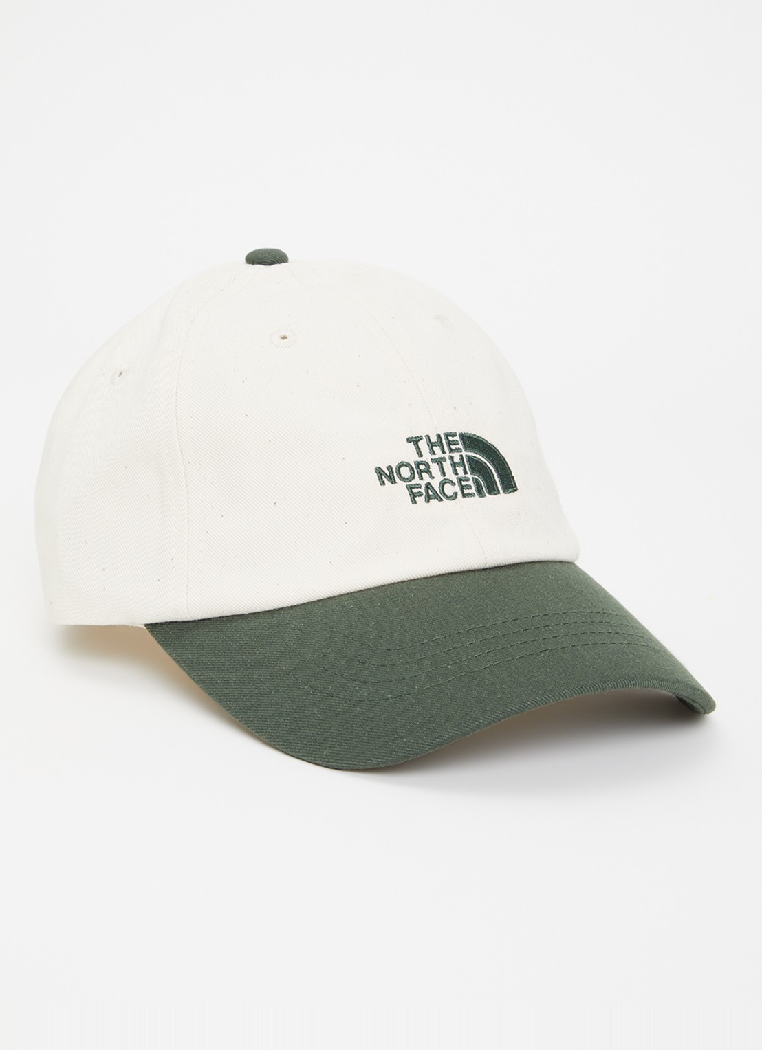 The North Face Norm pet met logoborduring - voorkant gebroken wit
