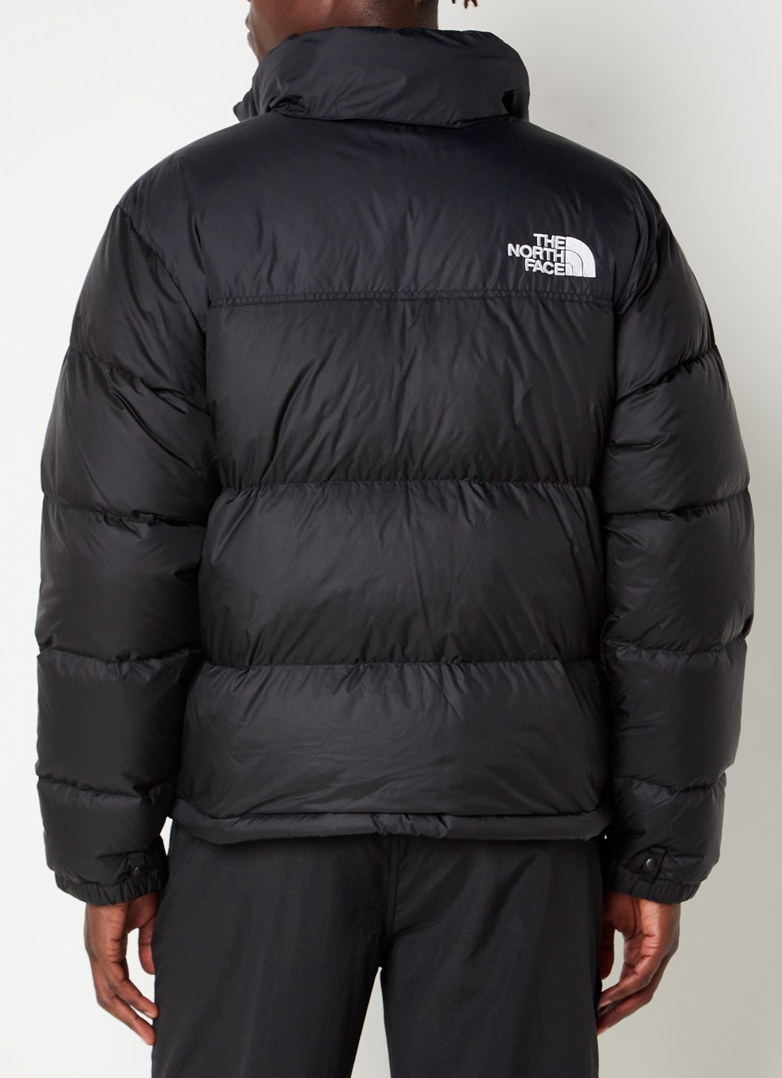 The North Face Puffer jas met donsvulling en ritszakken - achterkant zwart