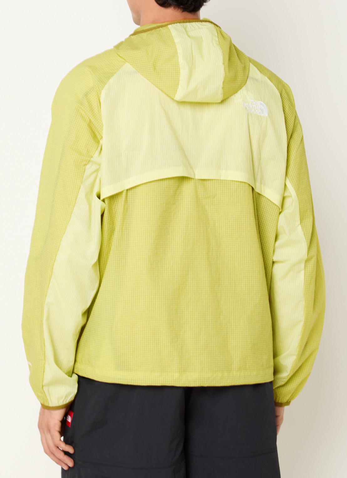 The North Face Windjack met capuchon en ritszakken - achterkant 4 lichtgroen
