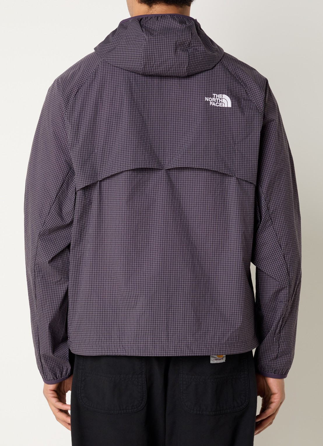 The North Face Windjack met capuchon en ritszakken - achterkant 3 paars