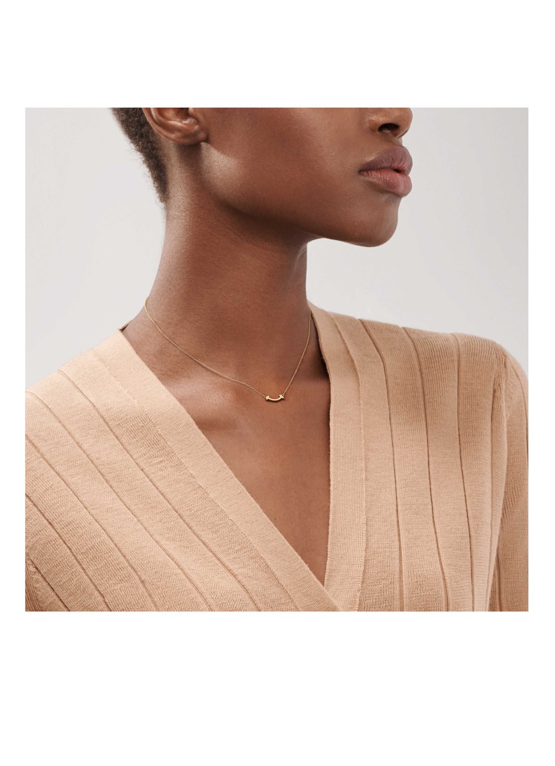 Tiffany & Co. Smile Mini ketting van 18 karaat geelgoud met hanger 40236 - detail undefined