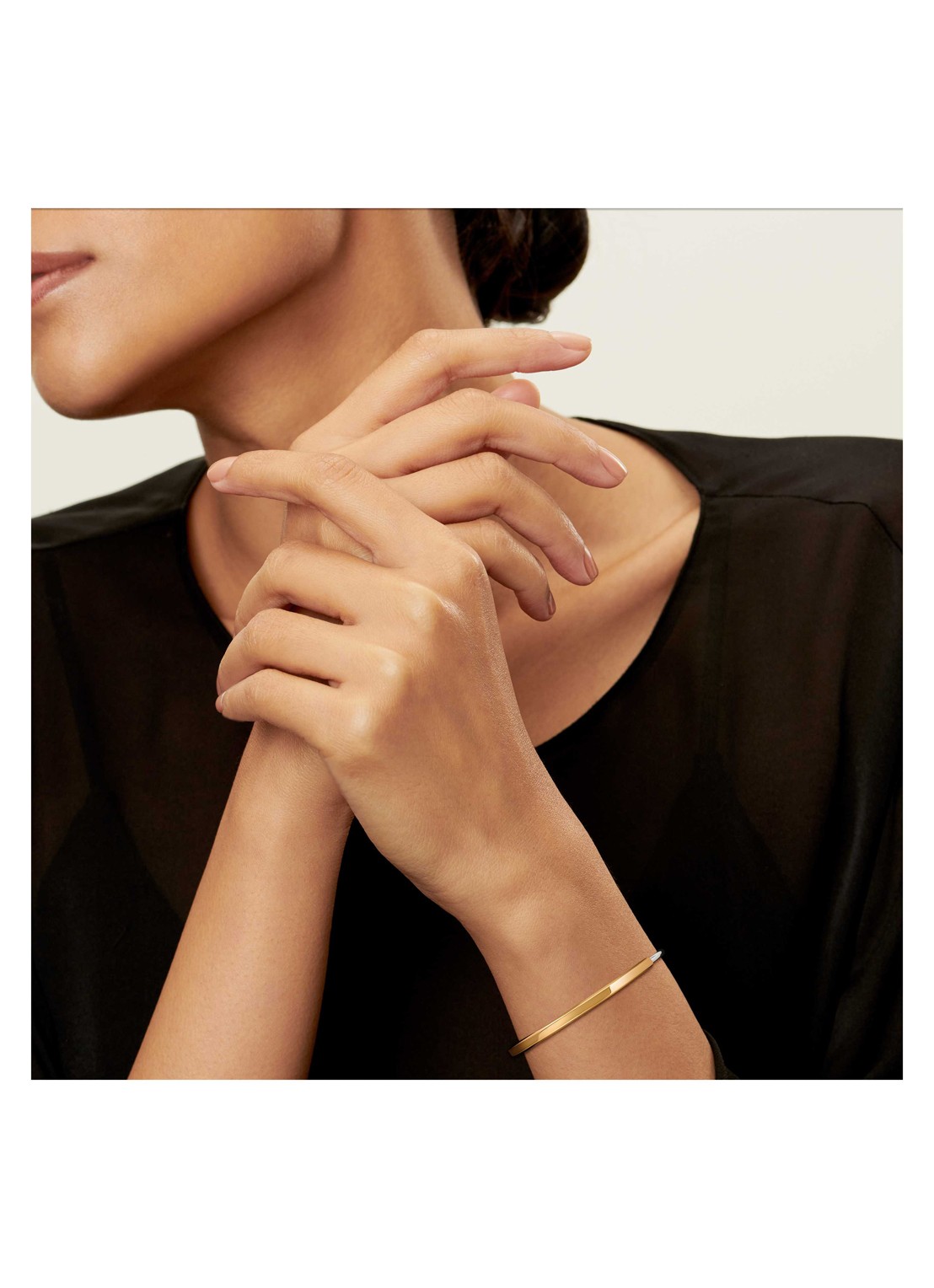 Tiffany & Co. Tiffany Lock bangle van 18 karaat wit- en geelgoud 82984 - detail undefined