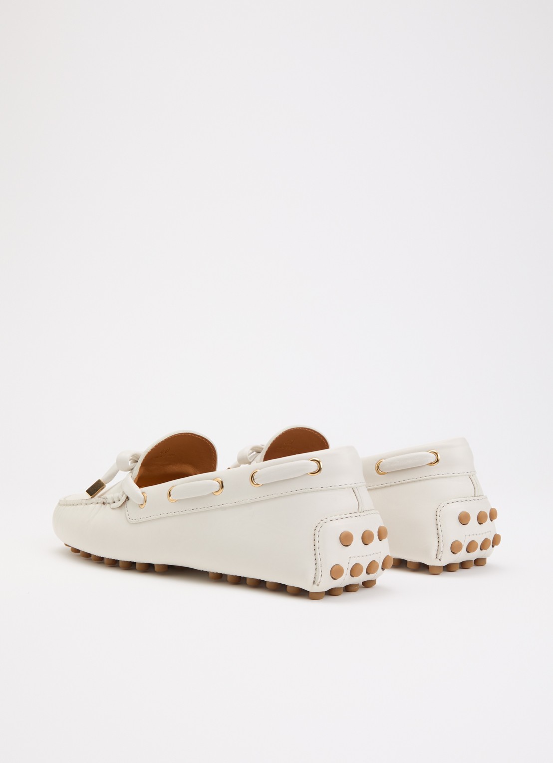 Tod's Gommino mocassin van kalfsleer - achterkant gebroken wit