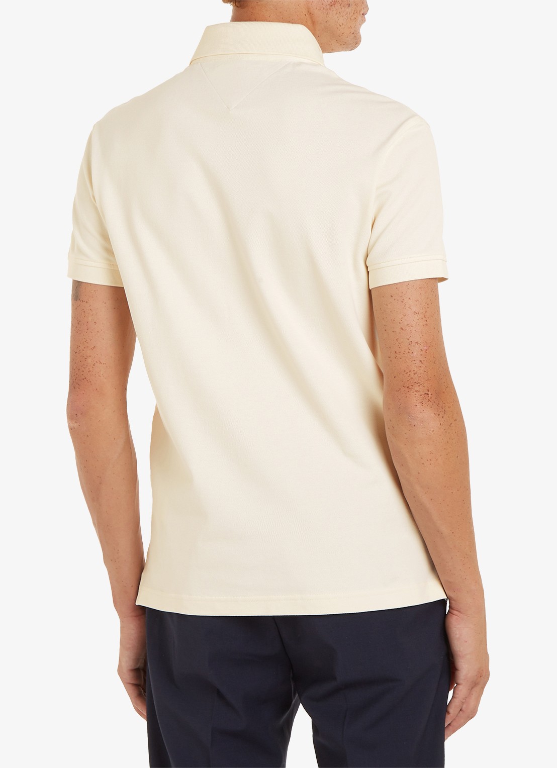 Tommy Hilfiger 1985 slim fit polo met logoborduring - achterkant calico  / beige