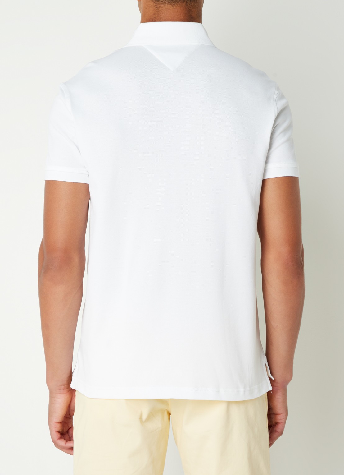 Tommy Hilfiger Core regular fit polo van piqué katoen met logoborduring - achterkant white-ybr / wit