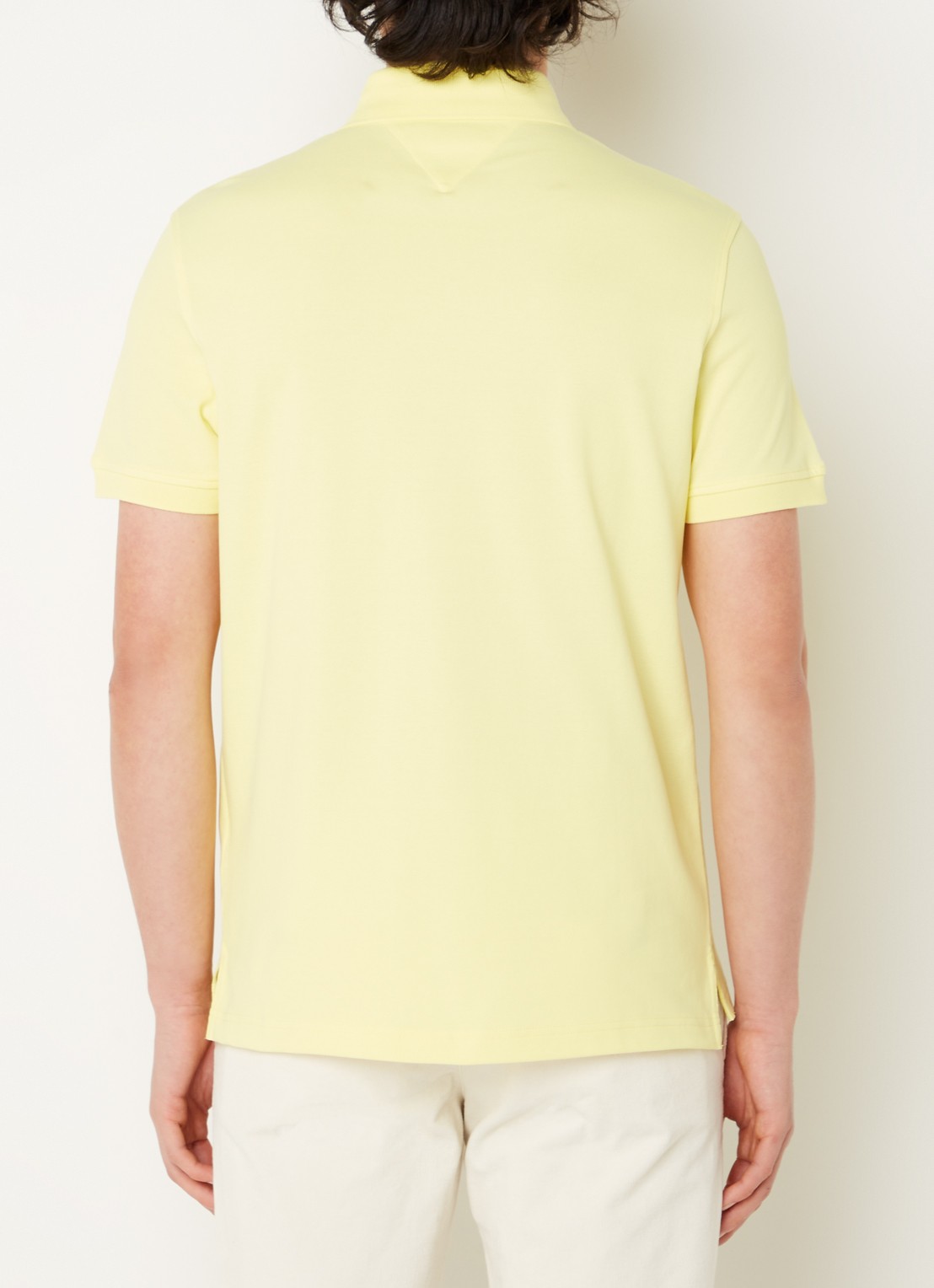Tommy Hilfiger Core regular fit polo van piqué katoen met logoborduring - achterkant yellow tulip / geel