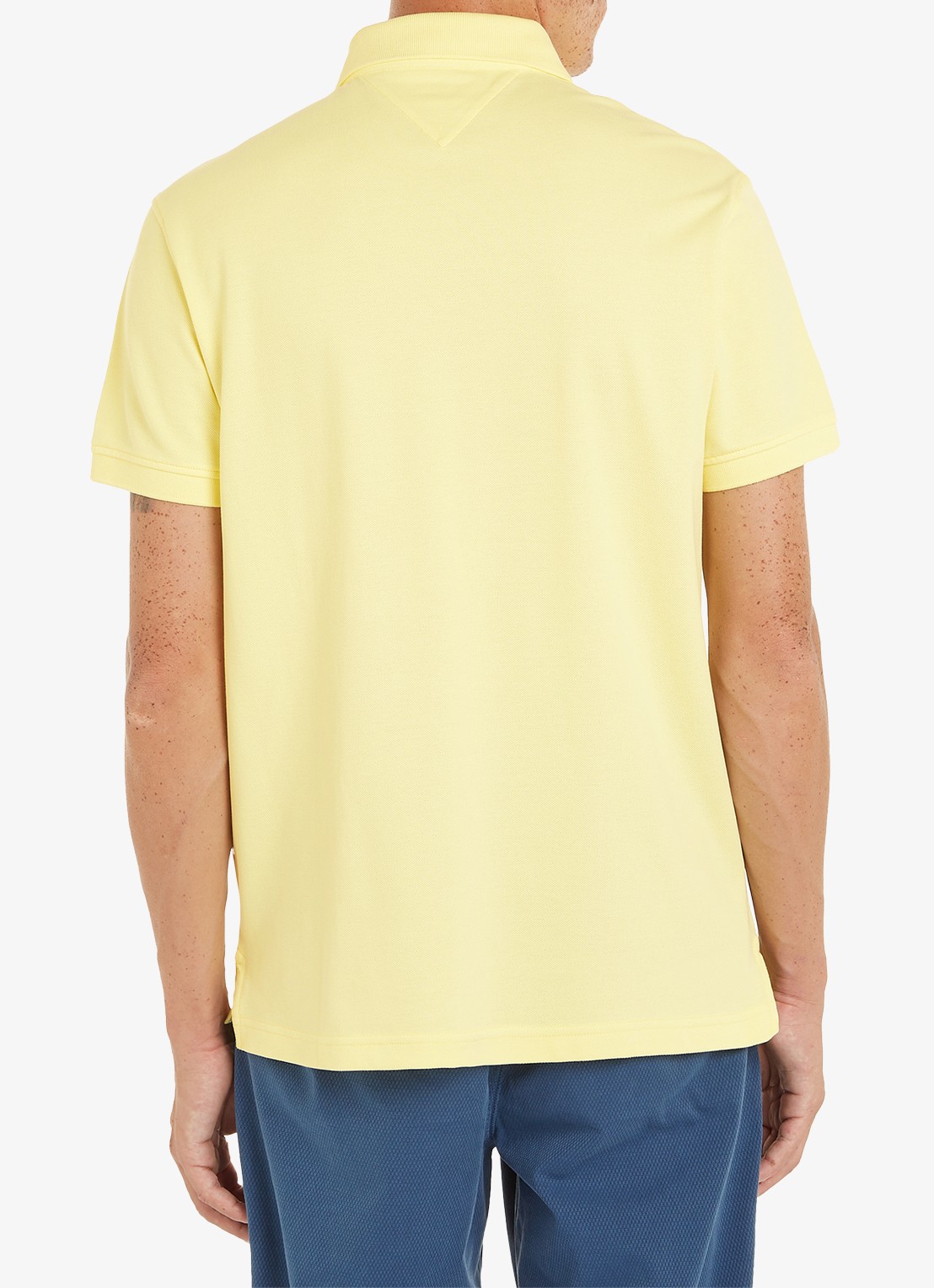 Tommy Hilfiger Core regular fit polo van piqué katoen met logoborduring - achterkant 2 yellow tulip / geel