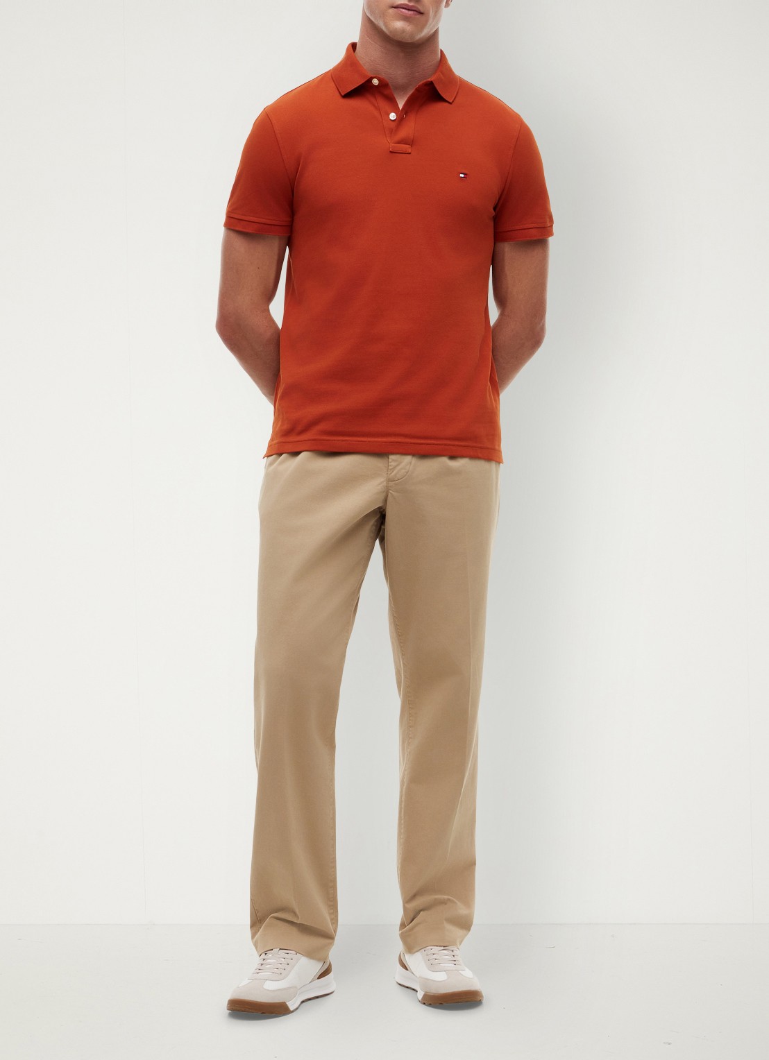 Tommy Hilfiger Core regular fit polo van piqué katoen met logoborduring - voorkant 5 rusty ochre-s0f / oranje