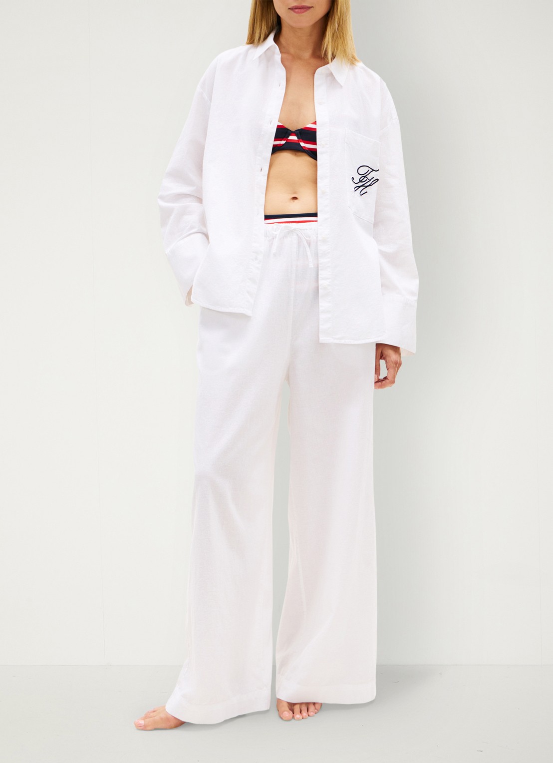 Tommy Hilfiger Low waist wide fit palazzo broek met logo - voorkant 3 wit