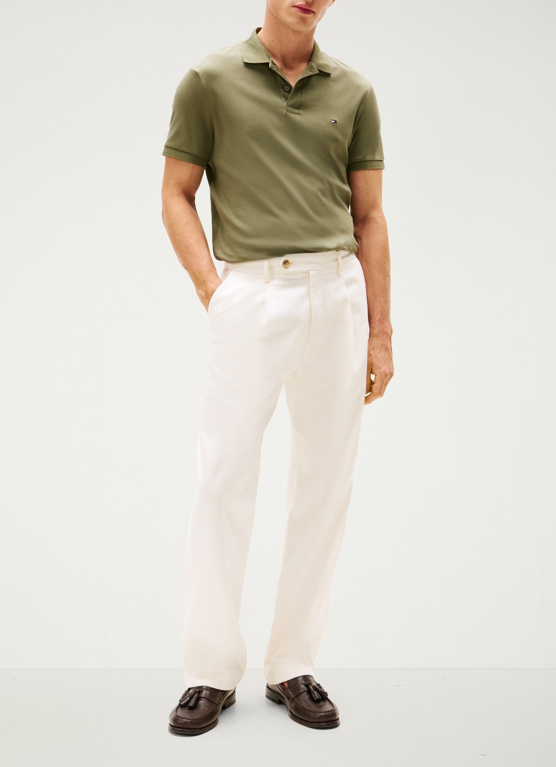 Tommy Hilfiger Regular fit polo met logo - voorkant 4 battle green-pli / groen