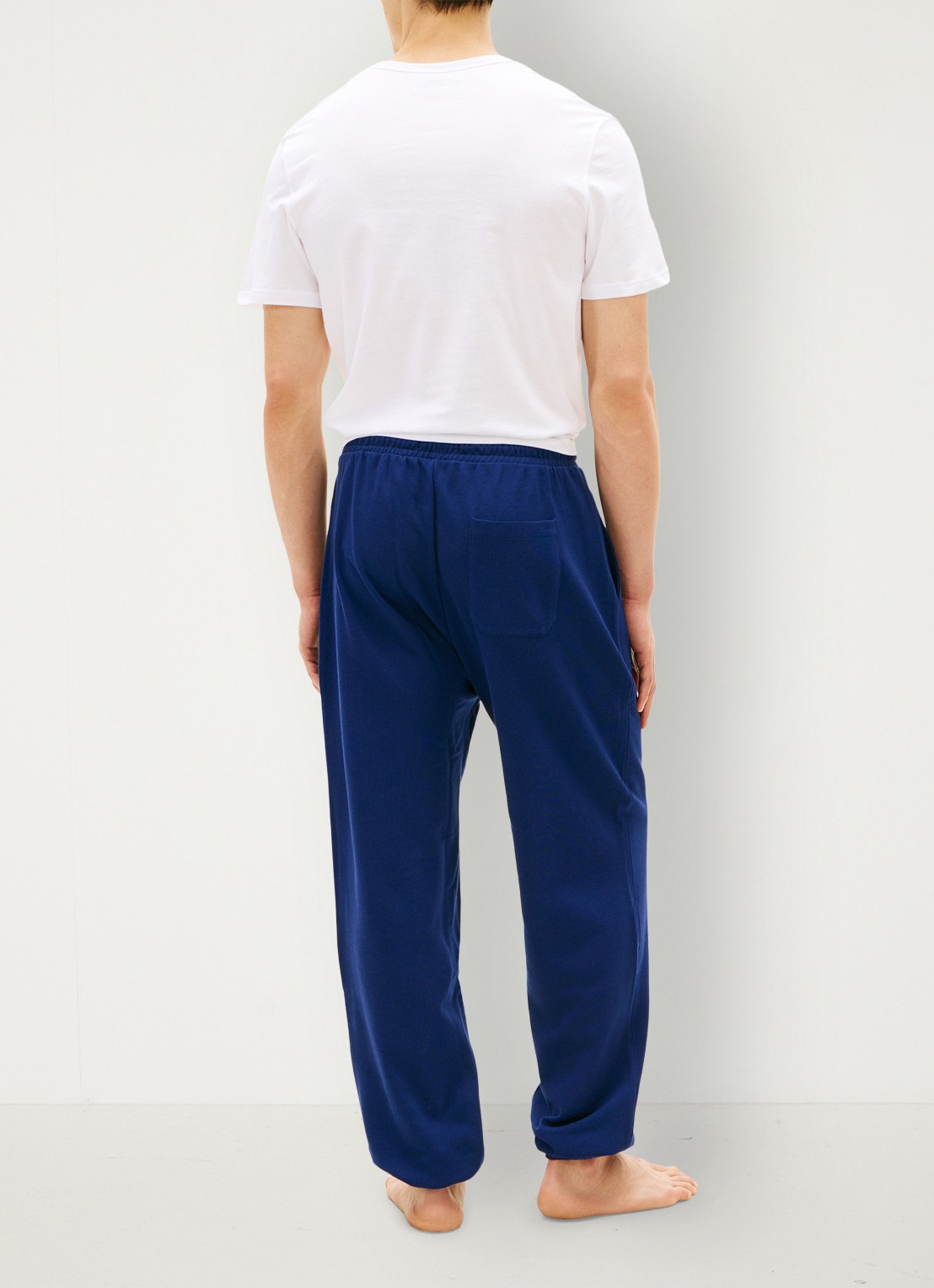 Tommy Hilfiger Tapered fit joggingbroek met steekzakken - achterkant donkerblauw