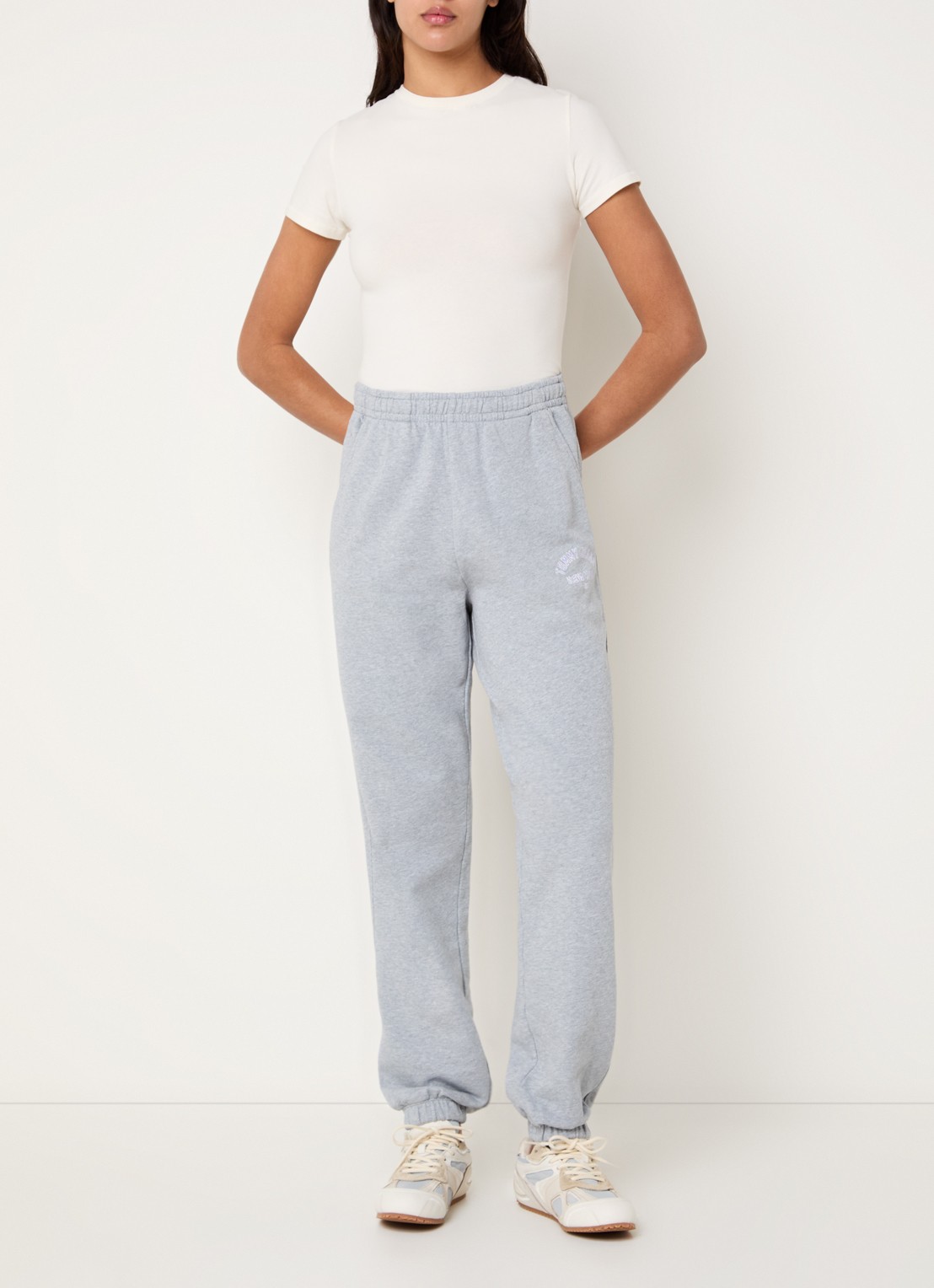 Tommy Hilfiger Varsity tapered fit joggingbroek met logo - voorkant 4 lichtgrijs