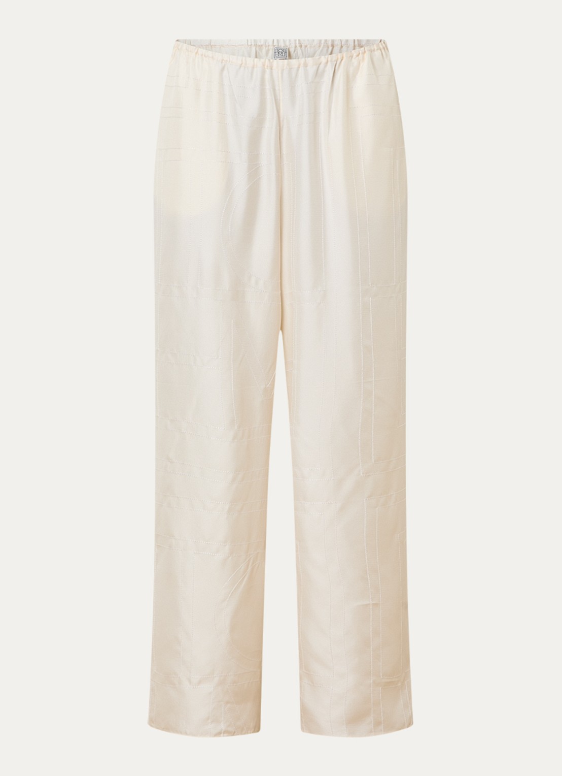 TOTEME Monogram low waist wide fit broek van zijde met logoborduring - voorkant gebroken wit