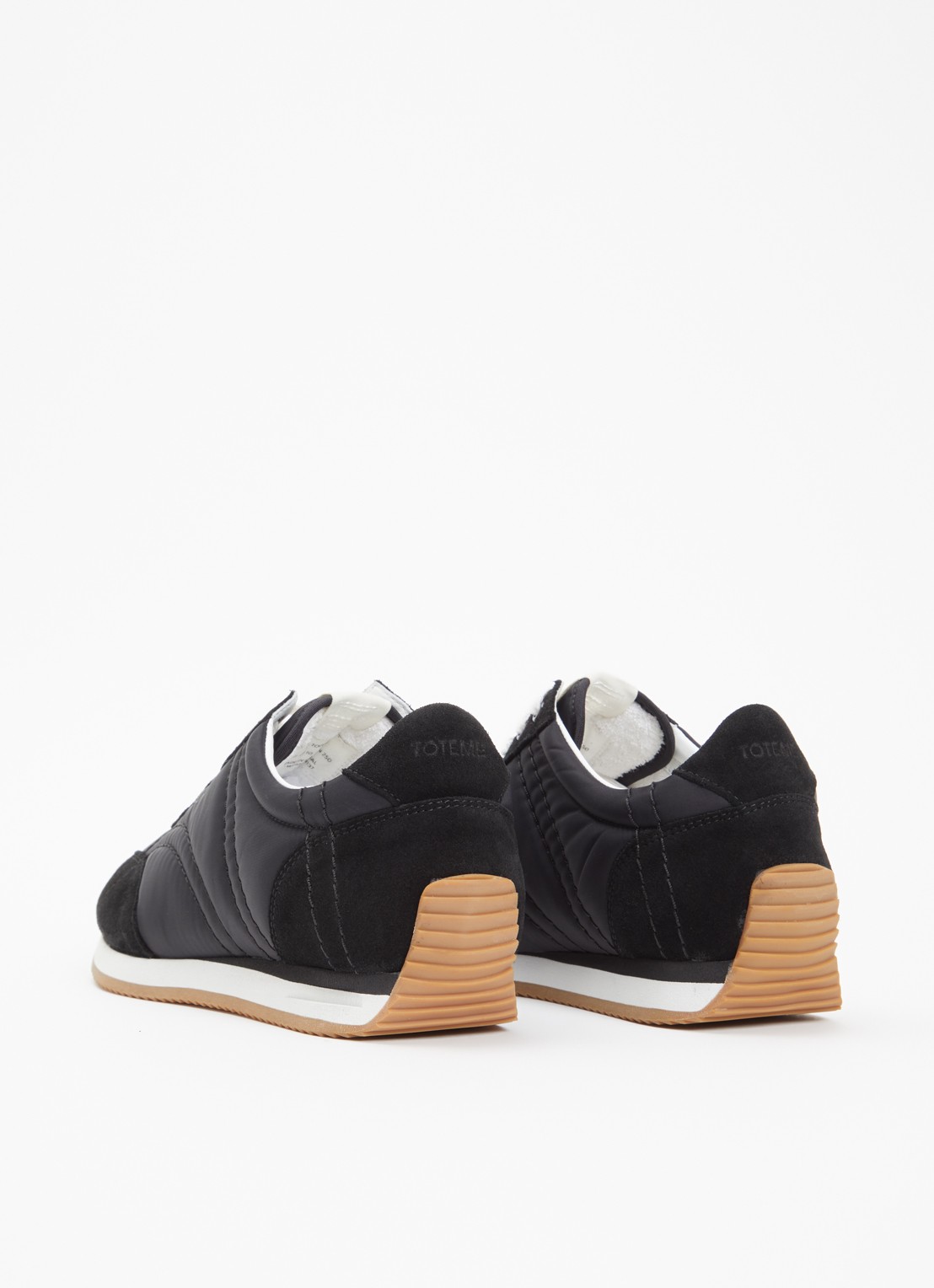 TOTEME Sport sneaker met details van suède - achterkant zwart