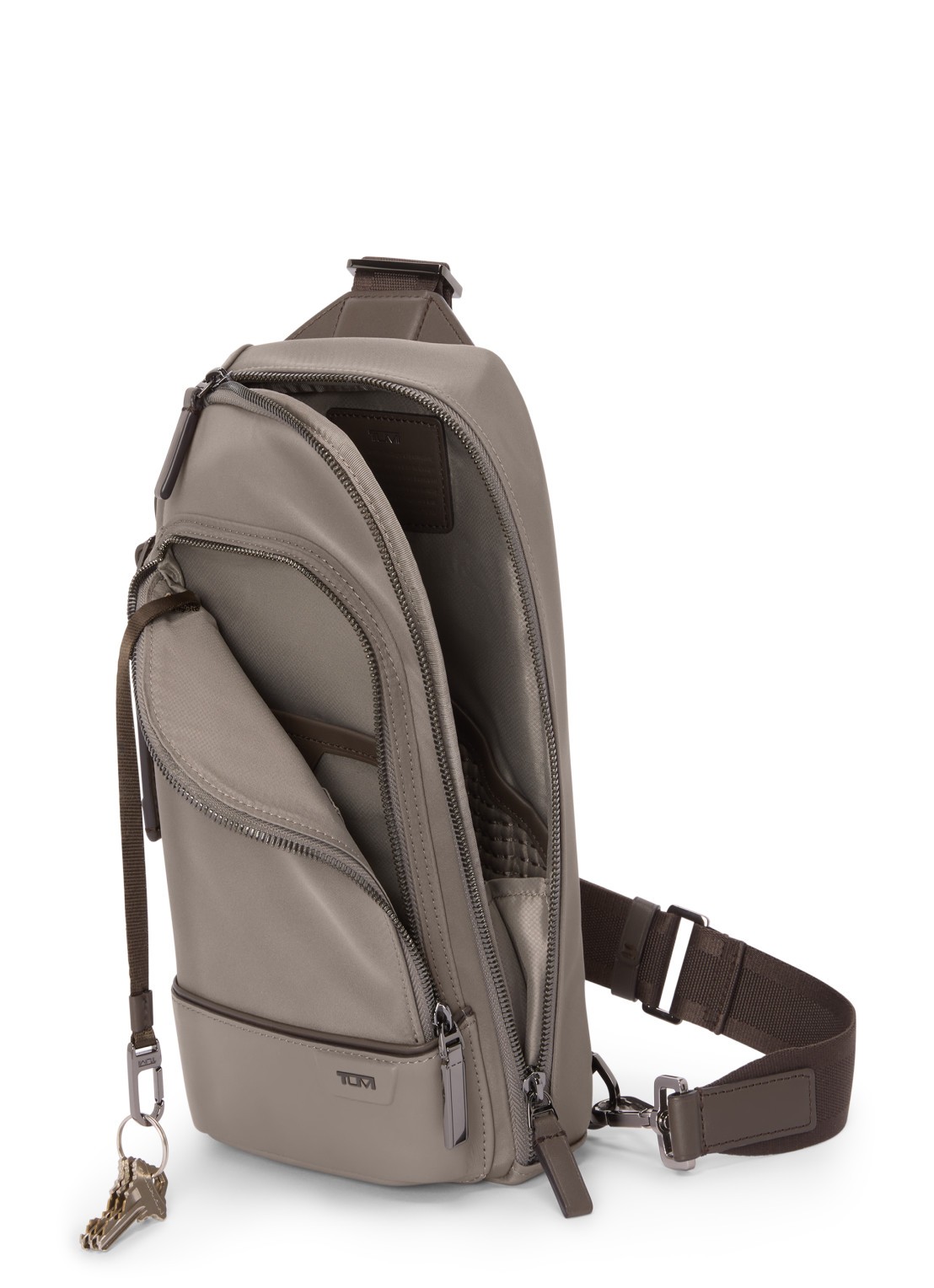 TUMI Gregory crossbodytas met leren details - achterkant taupe