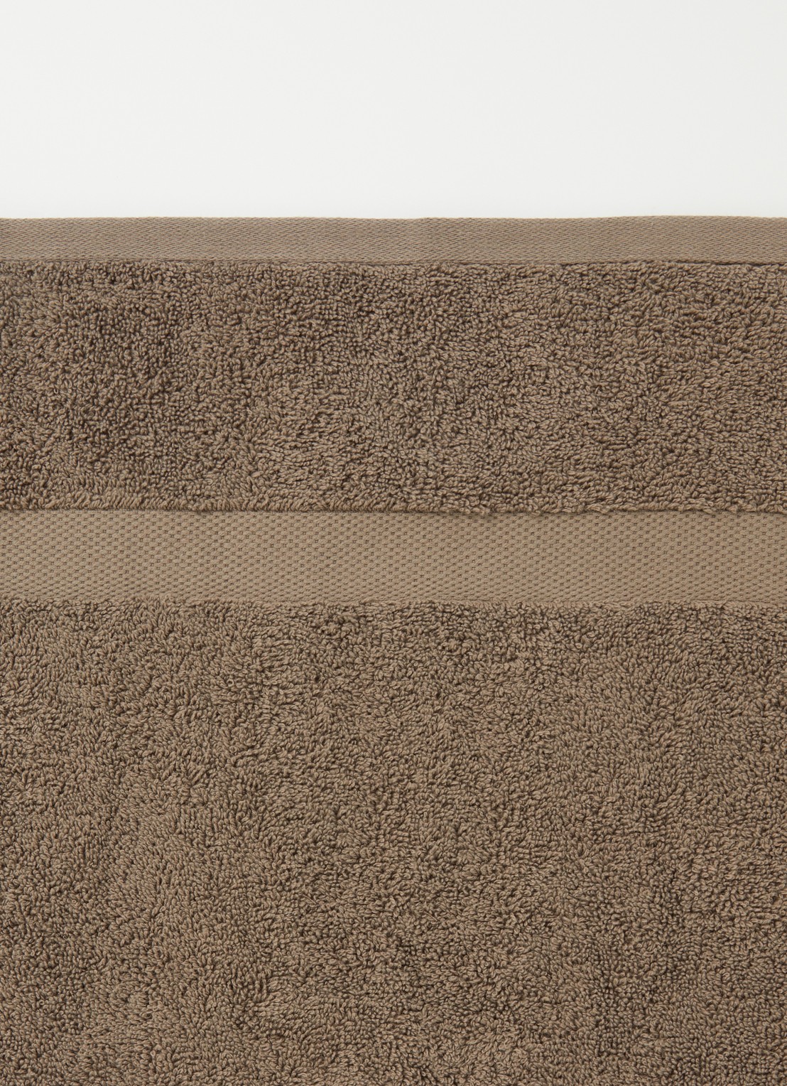 Vandyck Ranger badhanddoek - 650 gr/m2 - 68 x 127 cm - detail bruin