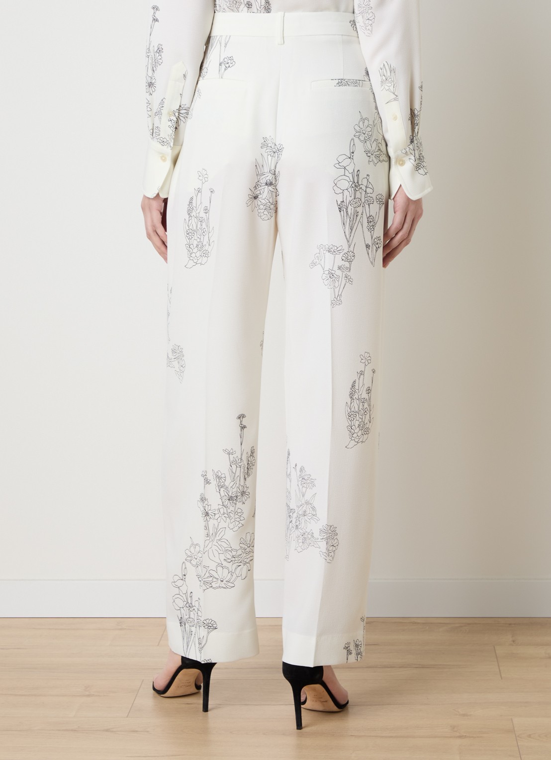 Victoria Beckham High waist tapered fit pantalon met bloemenprint - achterkant 3 gebroken wit