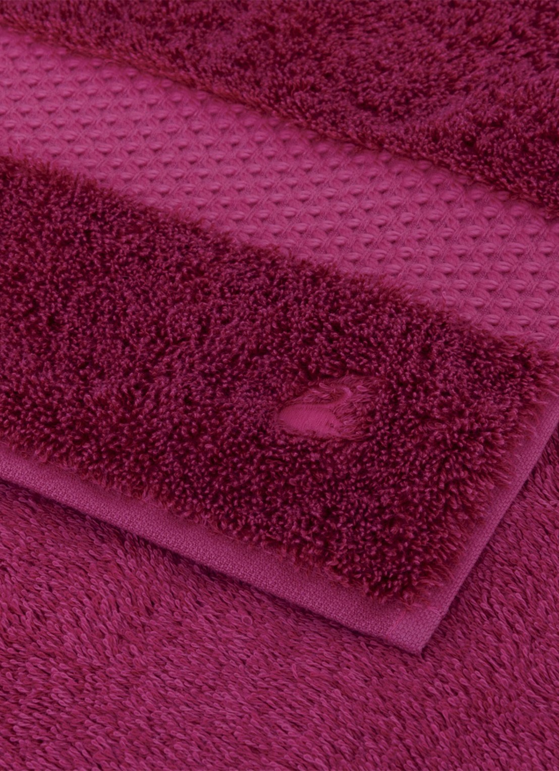 Yves Delorme Etoile gastendoek - 700 gr/m2 - 45 x 70 cm - achterkant fuchsia