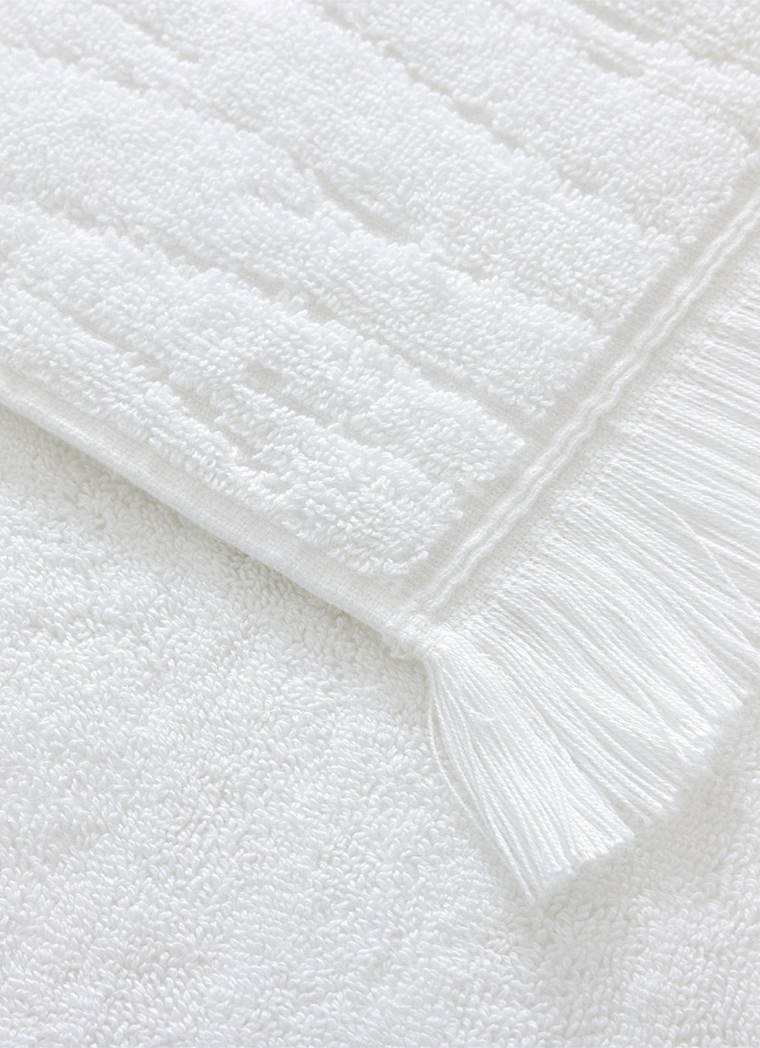Yves Delorme Luciole badlaken - 530 gr/m2 - 70 x 140 cm - achterkant 3 wit