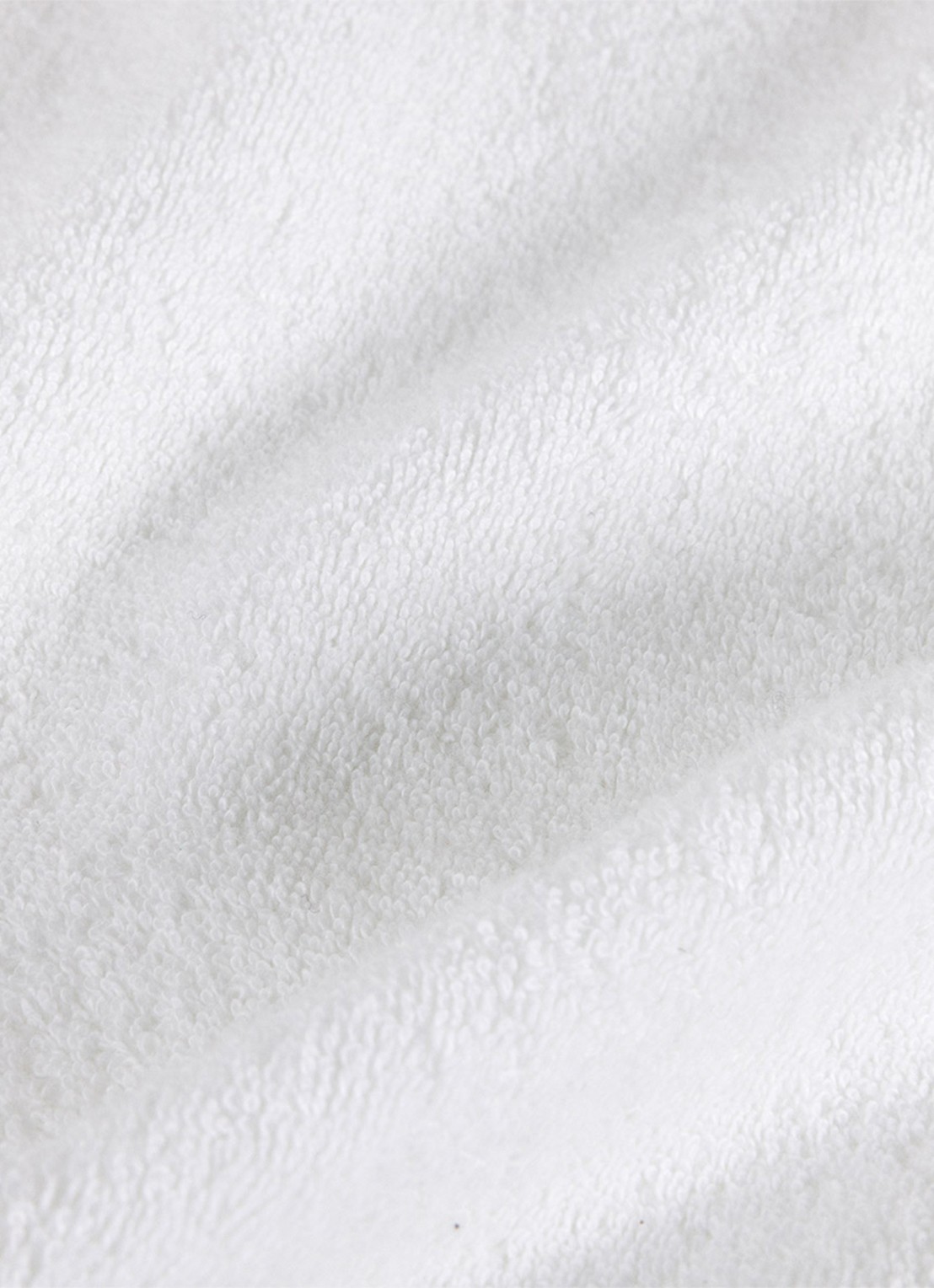 Yves Delorme Nature Amande washand - 550 gr/m2 - 33 x 33 cm - achterkant wit