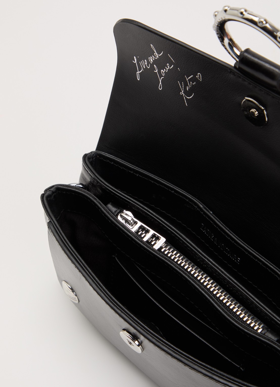 Zadig&Voltaire Kate clutch van leer met afneembare schouderriem - detail zwart