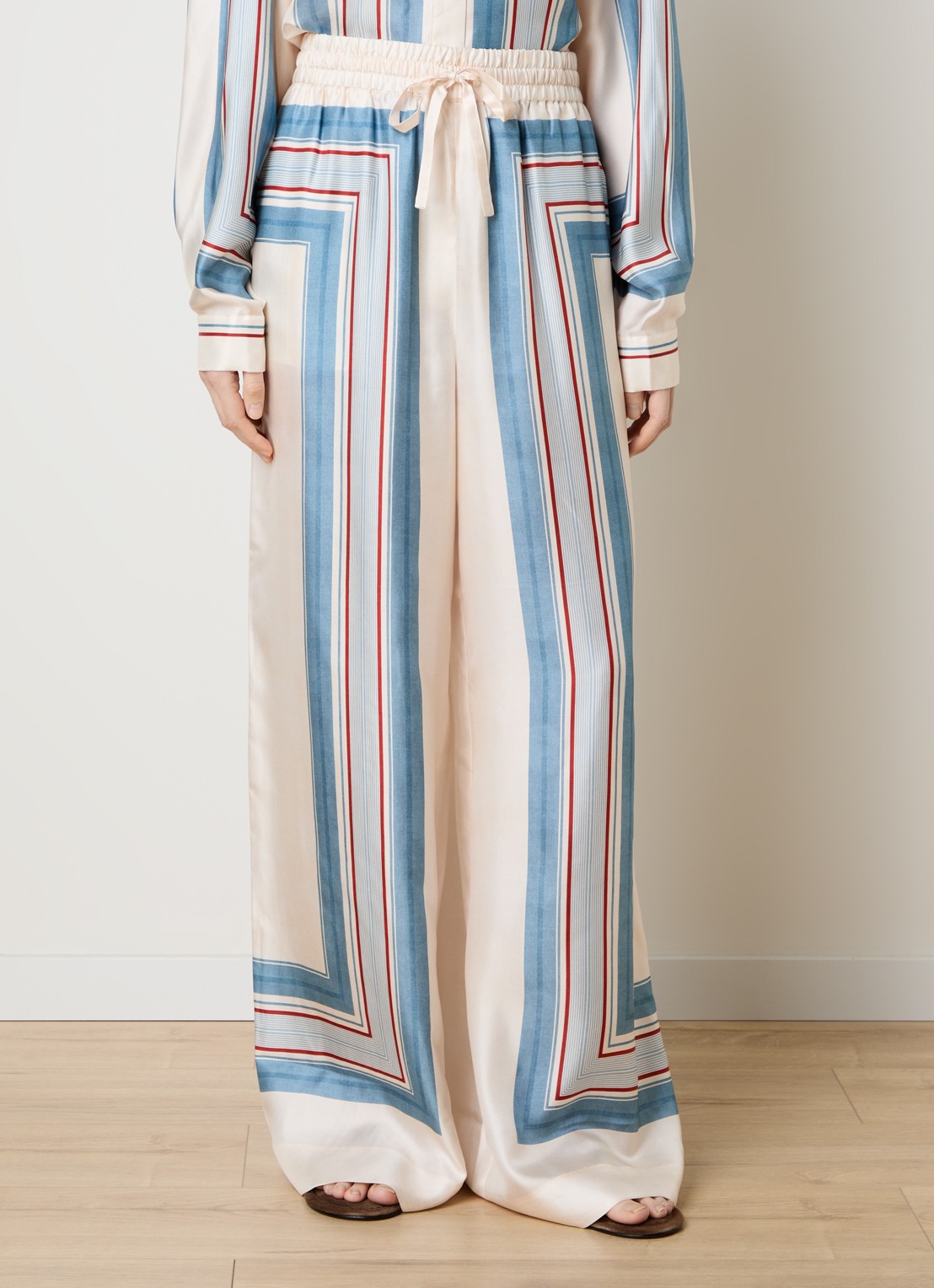 Zimmermann High waist wide fit palazzo broek van zijde met print - detail creme