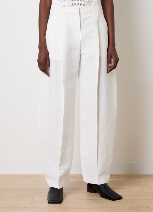 Alaïa High waist loose fit pantalon met steekzakken