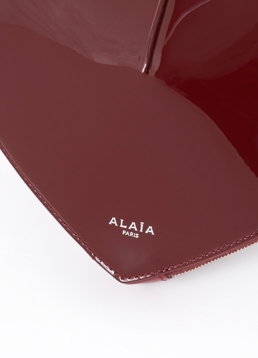 Alaïa Le Coeur crossbodytas van kalfsleer  - detail 4 bordeauxrood