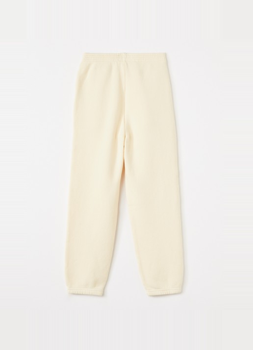 American Vintage Izubird tapered fit joggingbroek met logo - voorkant 3 lichtgeel