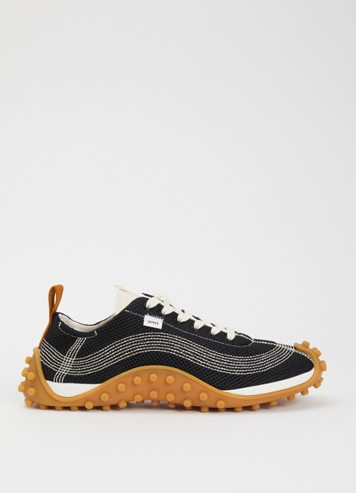 AMI Paris Mirage sneaker met schapenleren details