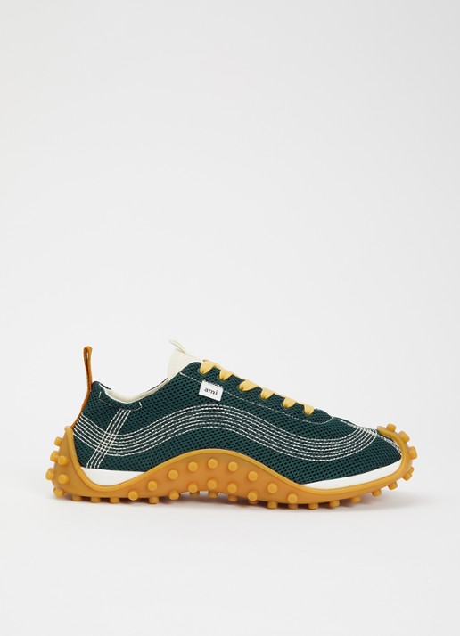 AMI Paris Mirage sneaker met schapenleren details - voorkant groen