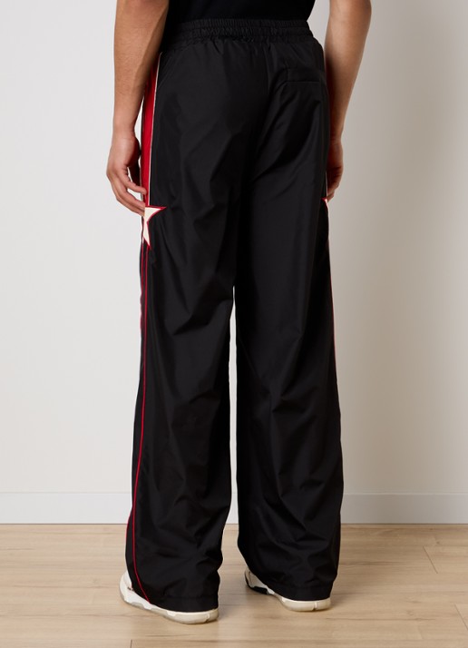 AMIRI Loose fit trackpants met logo en steekzakken - achterkant zwart