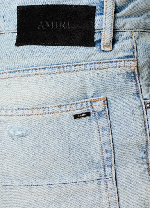 AMIRI MX1 loose fit jeans met destroyed afwerking - detail 5 lichtblauw