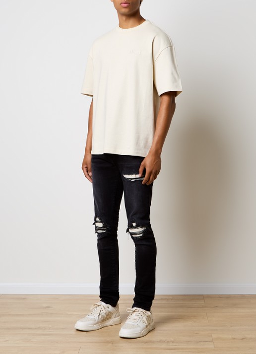 AMIRI Oversized T-shirt met logo- en backprint - voorkant 3 gebroken wit