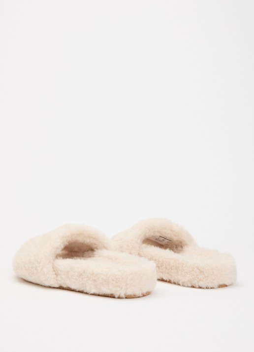 AMIRI Slipper van imitatiebont met logoborduring - achterkant creme