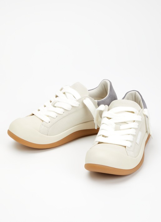 Axel Arigato Squish sneaker van nubuck met suède details - detail 3 beige