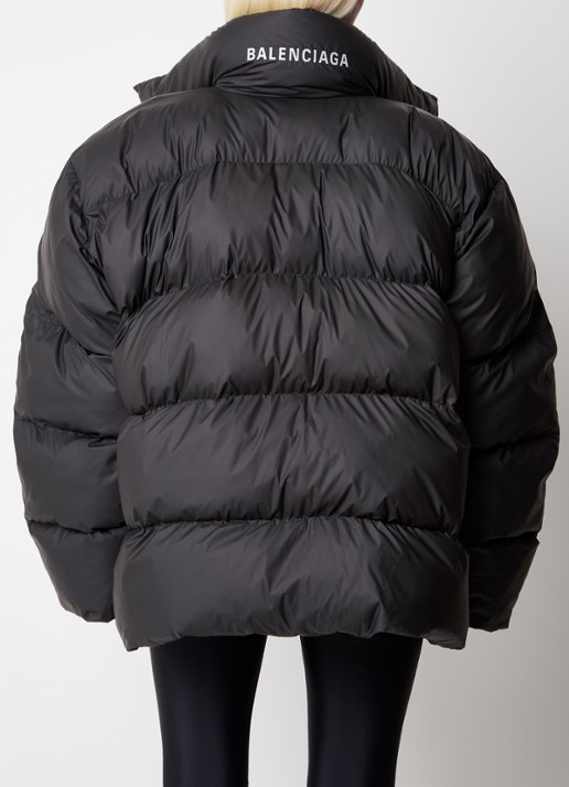 Balenciaga  Oversized puffer jack met opbergbare capuchon en logoborduring - achterkant zwart
