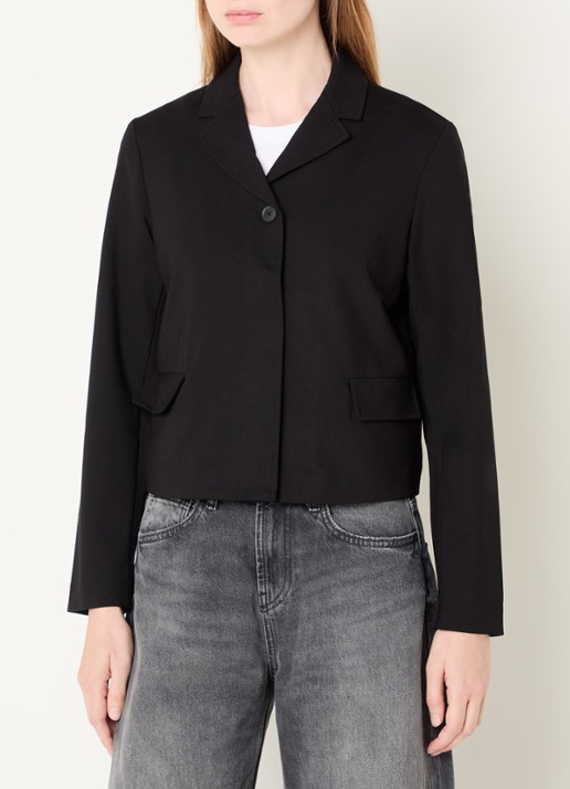 Benetton Jack met klepzakken