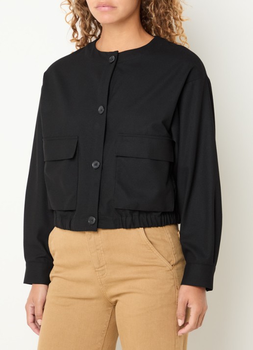 Benetton Jack met klepzakken
