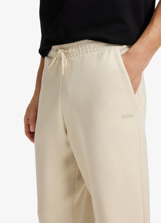 BOSS Hadiko tapered fit joggingbroek met steekzakken - detail 4 gebroken wit