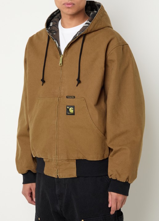 Carhartt WIP 50th Anniversary Edition Active reversible bomberjack met capuchon
