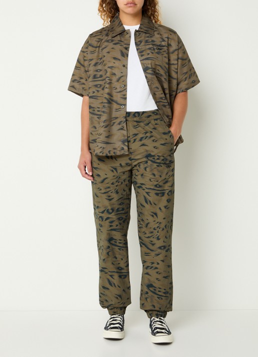 Carhartt WIP High waist tapered fit trackpants met steekzakken - voorkant 2 bronsgroen