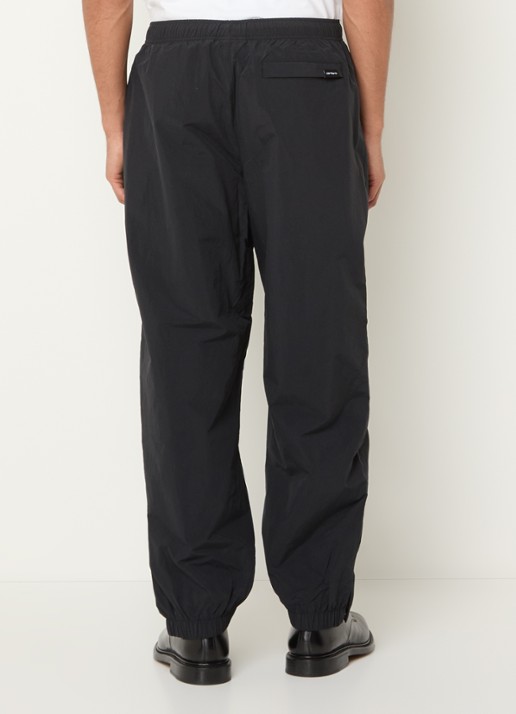 Carhartt WIP Tapered fit trackpants met logo en steekzakken - achterkant zwart