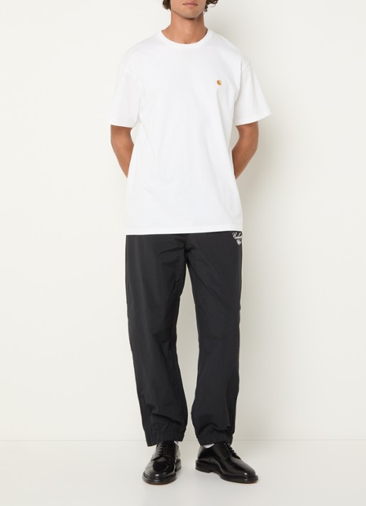 Carhartt WIP Tapered fit trackpants met logo en steekzakken - voorkant 5 zwart