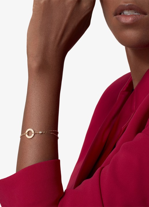 Cartier LOVE armband, van 18 karaat geelgoud met 0.03 ct diamant CRB6038300 - voorkant 2 geelgoud