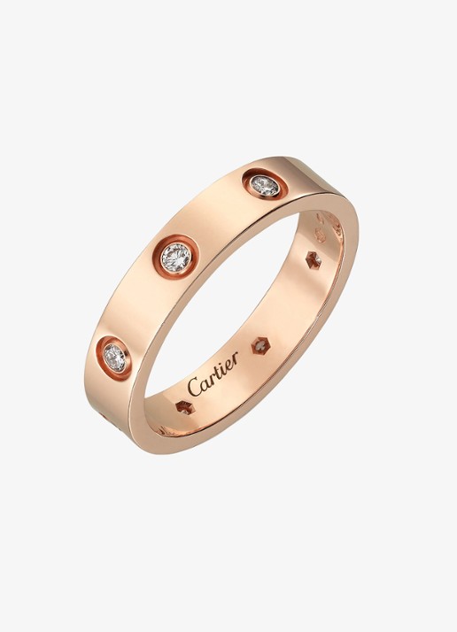 Cartier LOVE trouwring, klein model van 18 karaat roségoud met 0.19 ct diamant CRB4050800 - detail roségoud