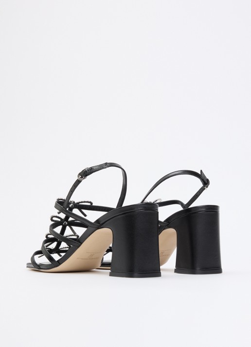 Claudie Pierlot Aurianne sandalette van schapenleer met strikdetail - achterkant zwart
