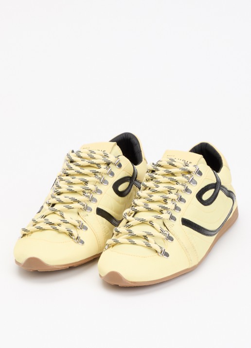 Claudie Pierlot Swing sneaker met details van kalfsleer - detail citroengeel