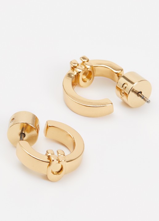 Coach C Huggie oorringen - detail goud
