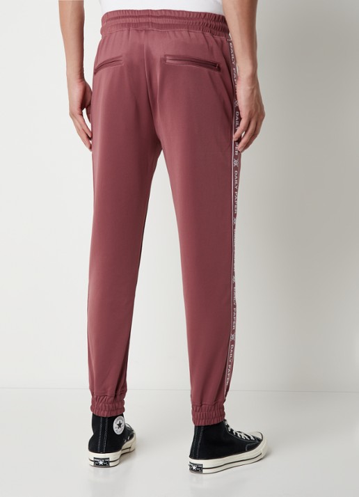 Daily Paper Etape tapered fit cropped trackpants met ritszakken en logoband - achterkant 5 roodbruin
